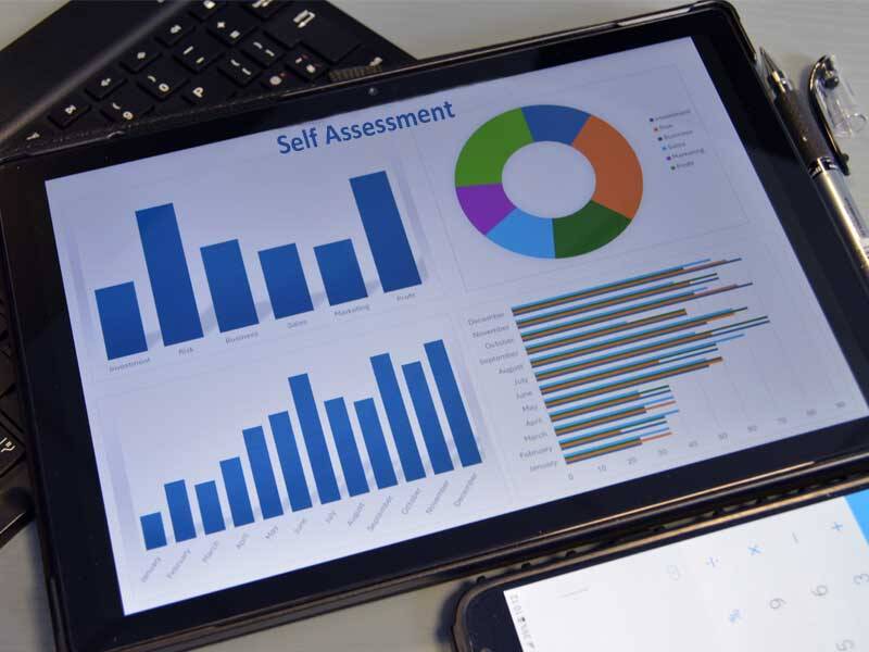 Charts and figures on the screen of tablet computer